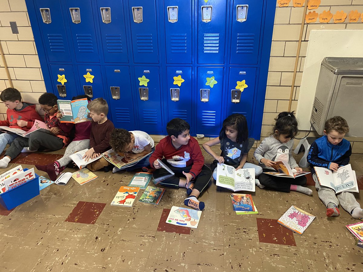 MPS_Buckley's tweet photo. It’s Read Across America week at Buckley. We had Sock, Drop and Read today in the hallway!  We read in the hallway with our crazy socks! https://t.co/lkhPoIh7mO