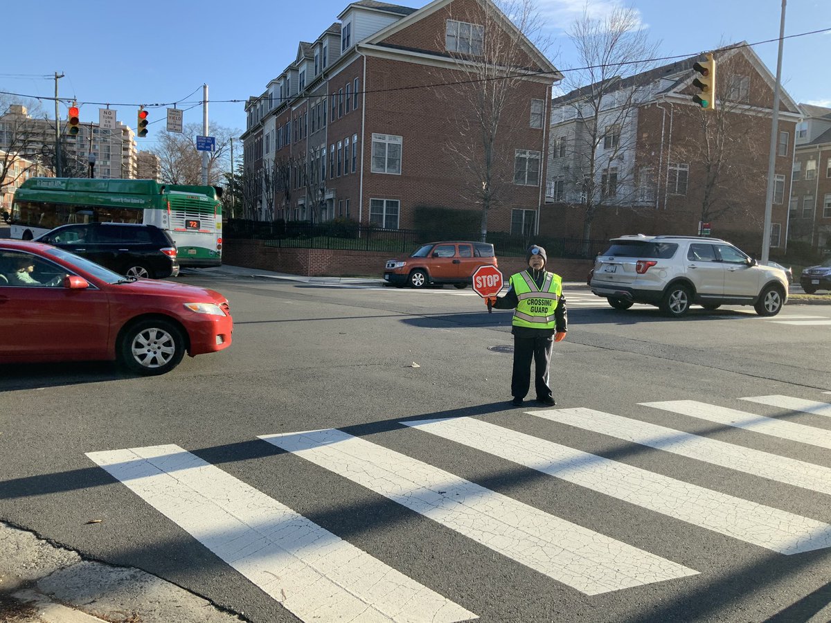 lsullivan's tweet photo. Students with their crossing guard as part of Arlington Fire Department Classroom Contest @ArlingtonVaFD #ClassroomContest #KWBPride Barrett Tiger Mascot https://t.co/hUv3SIL8r8
