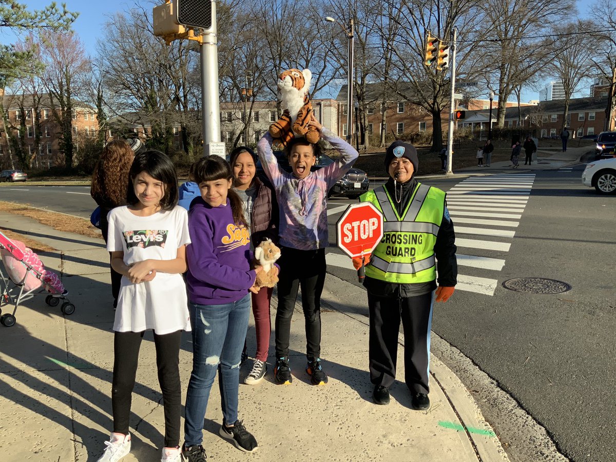 lsullivan's tweet photo. Students with their crossing guard as part of Arlington Fire Department Classroom Contest @ArlingtonVaFD #ClassroomContest #KWBPride Barrett Tiger Mascot https://t.co/hUv3SIL8r8