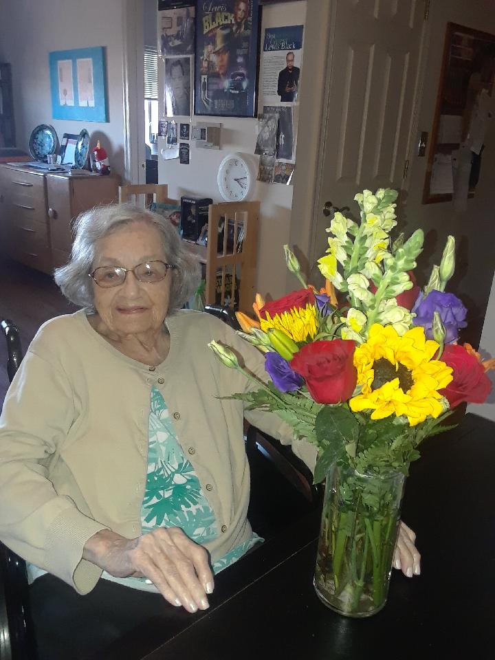 TheLewisBlack's tweet photo. Just sharing a great pic of my mom, Jeannette and a bouquet from an admirer. https://t.co/YwMxMkUOQ5