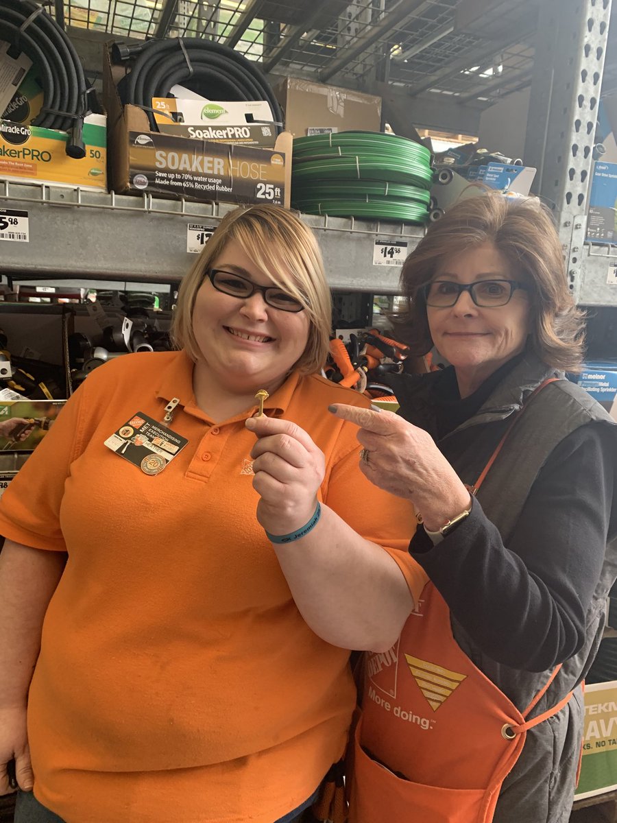 Heather receiving the Golden Hammer from Debbie!! Thanks for your great quality walk and dedication to GS!! Ready for the customer!!