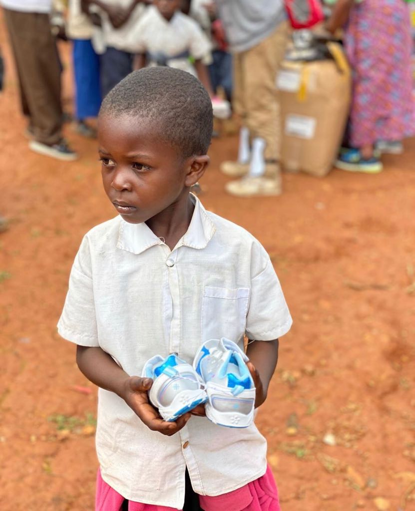 They walk miles and miles to and from work/school every single day barefoot 😟. Thanks to your love and support we were able to give these beautiful faces their first pair of sneakers ever today! They will no longer walk barefoot on soil that is contaminated with circle worms!