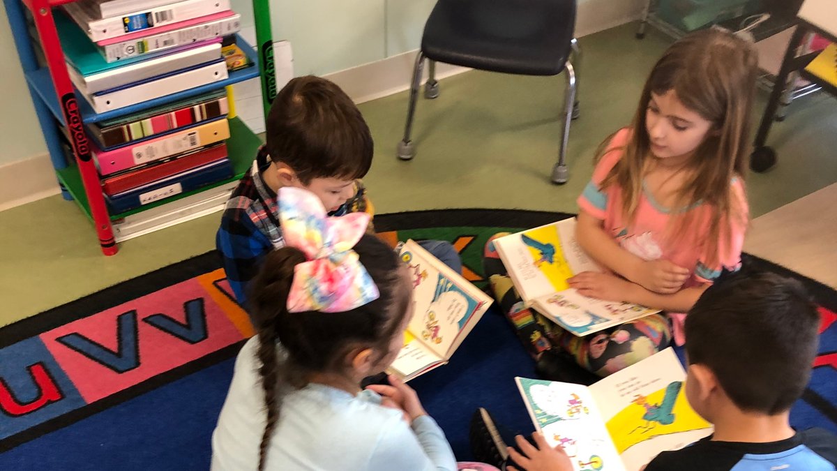 janetdancy's tweet photo. Dr. Seuss book clubs begin today.  Firsties reading, talking, and creating posters about books is the plan!  #firsties #DrSeussWeek https://t.co/R4WqgcXAz7