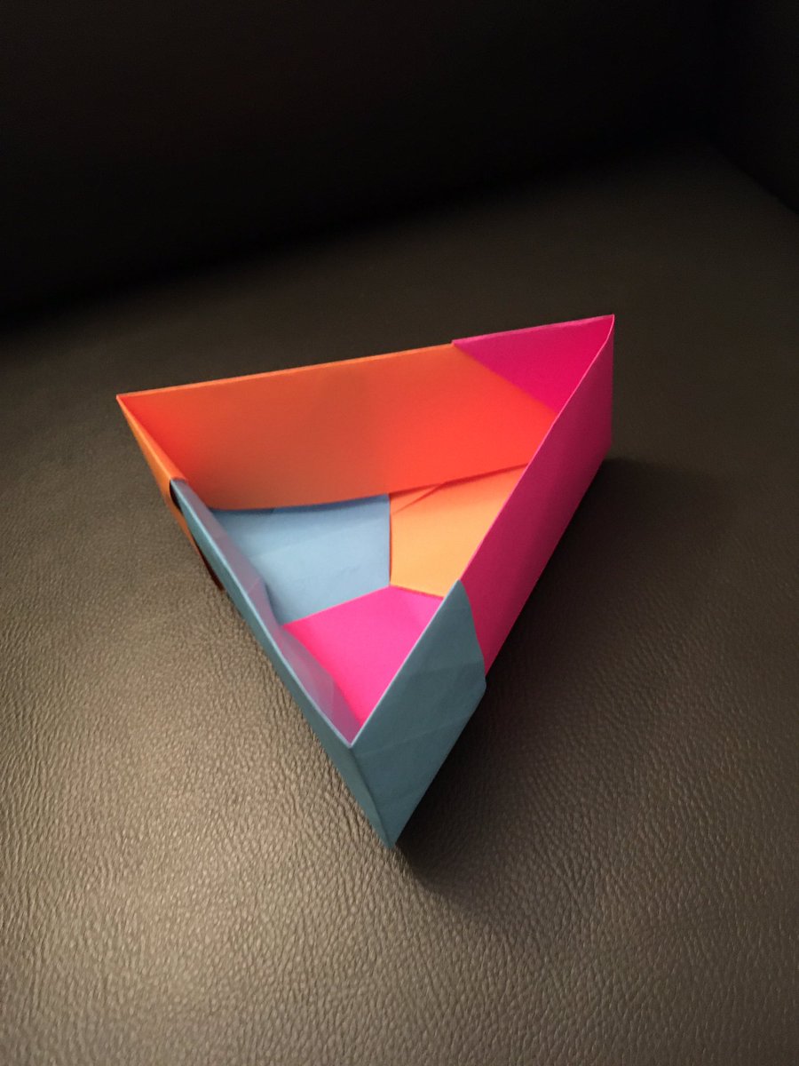 Ruth4170's tweet photo. Day 18: triangle box. This is made of three interlocking pieces. There’s some kind of math behind how you can fold squares and halves and quarters and get a equilateral triangle. #digme406 https://t.co/dTVixxjvF8
