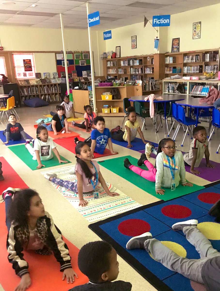 DeepCreekLIB's tweet photo. Second Graders were really into our yoga class based of the story We’re Going on a Bear Hunt (one of my faves). It was extremely relaxing. #snakepose #treepose #bcpslms @DCESBCPS https://t.co/4CKHPdVl1N