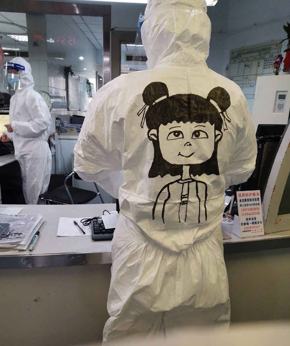 yicaichina's tweet photo. A nurse from Wuhan, the epicenter of the #COVID19 outbreak, has been drawing cartoons on the back of her colleagues’ hazmat suits to ease the tension on the frontlines. Some of her drawings include popular cartoon characters #SailorMoon, #PeppaPig and #Pikachu. https://t.co/B3ZMGn8eQm