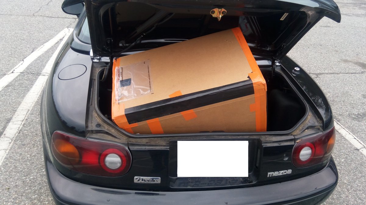 kranberrijam's tweet photo. Bonus pic of the shipping box in my poor tiny Miata. #SmallCarProblems https://t.co/Y2oOeiXl4R
