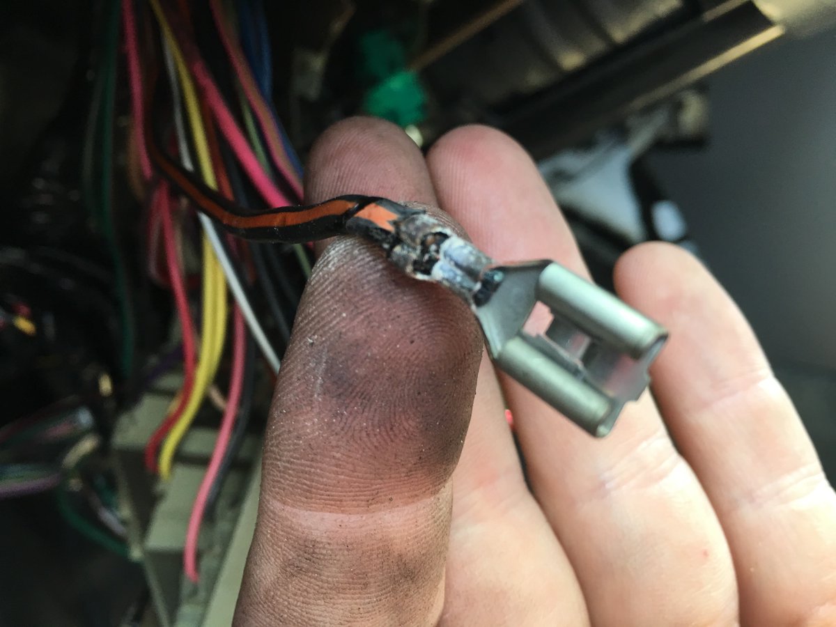 A customer’s windshield wipers operated very slowly, and his turn signals would intermittently quit blinking. After some meticulous troubleshooting and tracing circuits, we found the culprit: this little connector, in the back of the fuse box, had severely corroded.