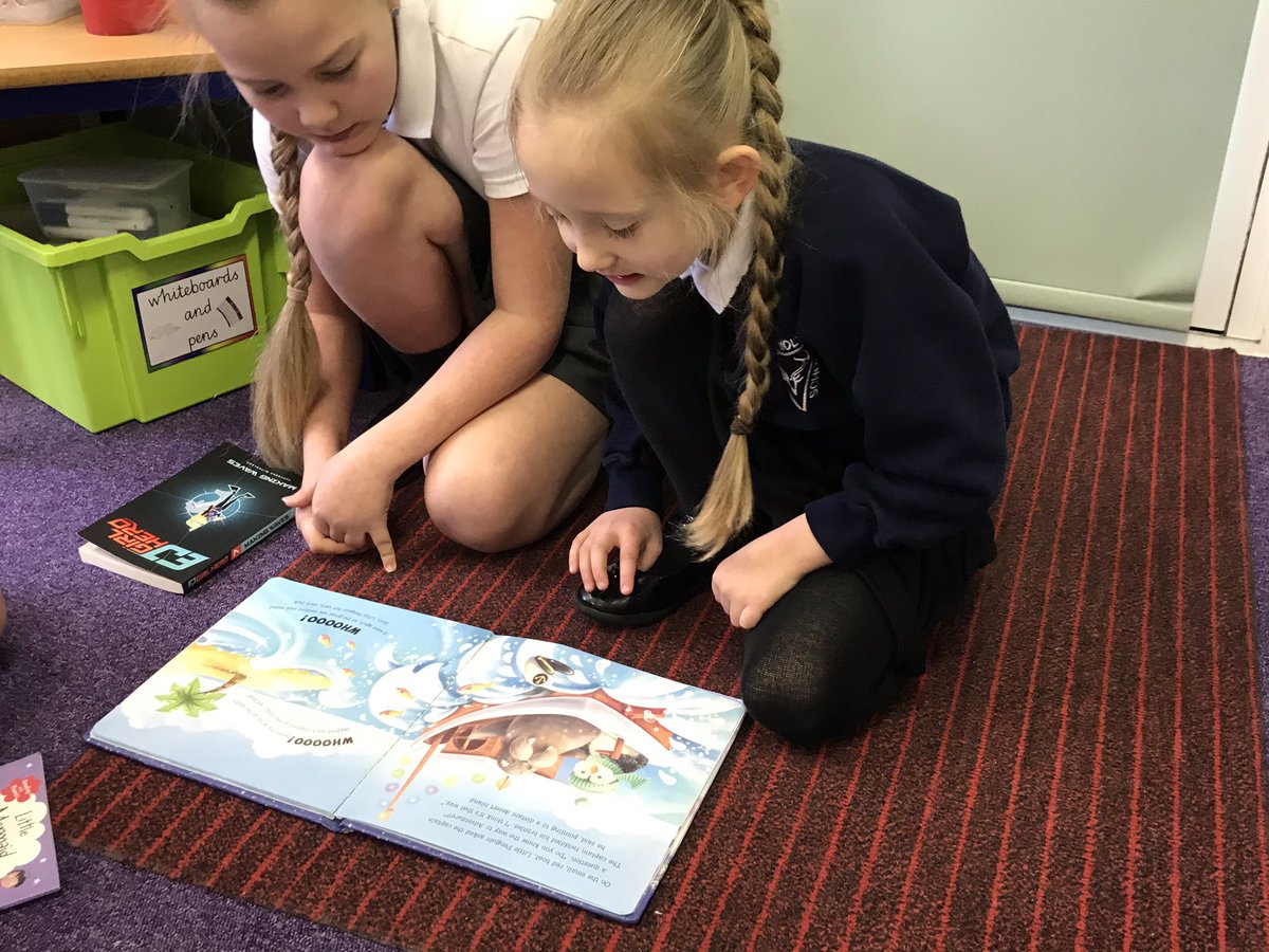 Oldest children and youngest sharing water themed books this morning.