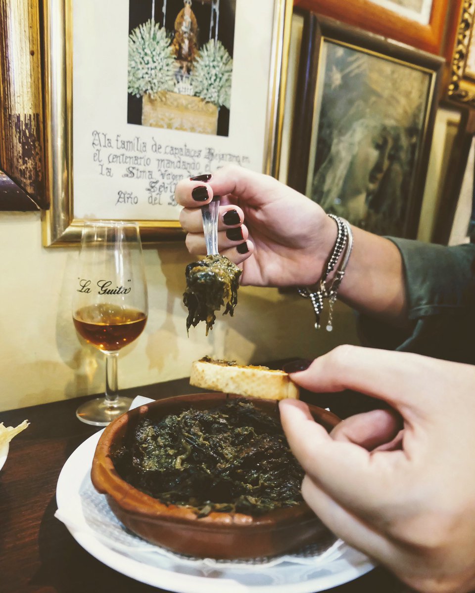 When in Sevilla, order espinacas con garbanzos. This classic tapa marries spinach &amp; chickpeas w/ some seriously aromatic spices. And it's just the season for it! Typically eaten during Lent, the dish is fragrant w/ garlic, cumin &amp; paprika, packing an unforgettable punch of flavor