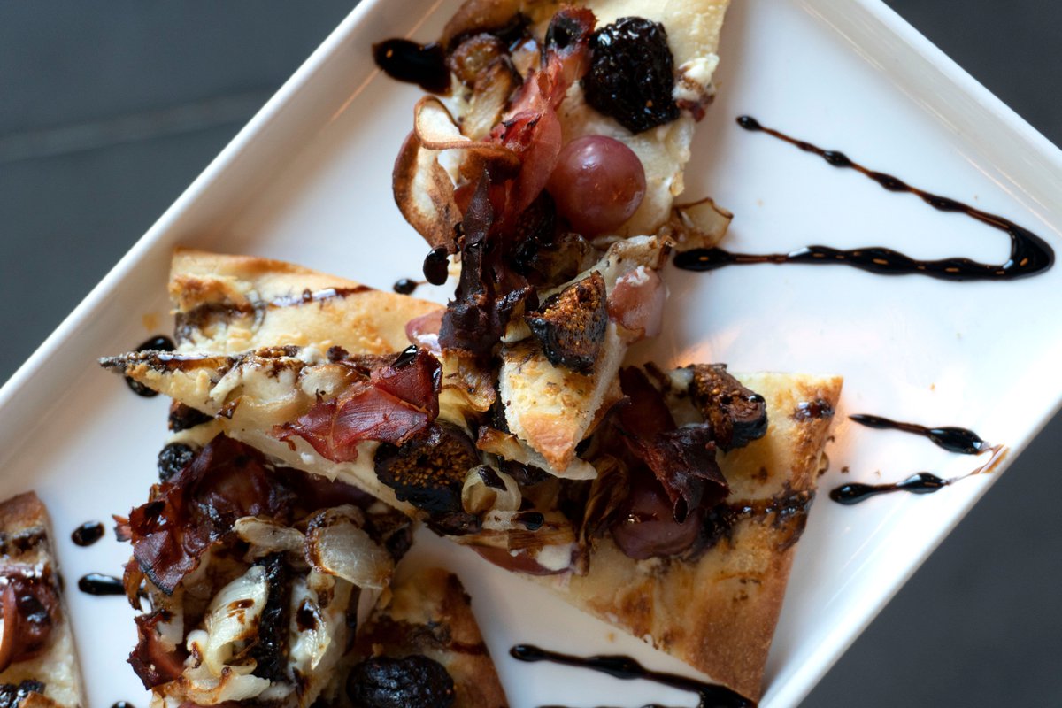 WallenpaupackBC's tweet photo. Really figgin' delicious. Try our Fig + Prosciutto Flatbread with Roasted Grapes, Cippolini Onions, Roasted Garlic &amp; Herb Cheese Spread &amp; Balsamic Glaze on a Flatbread https://t.co/NZ2kH75sMa