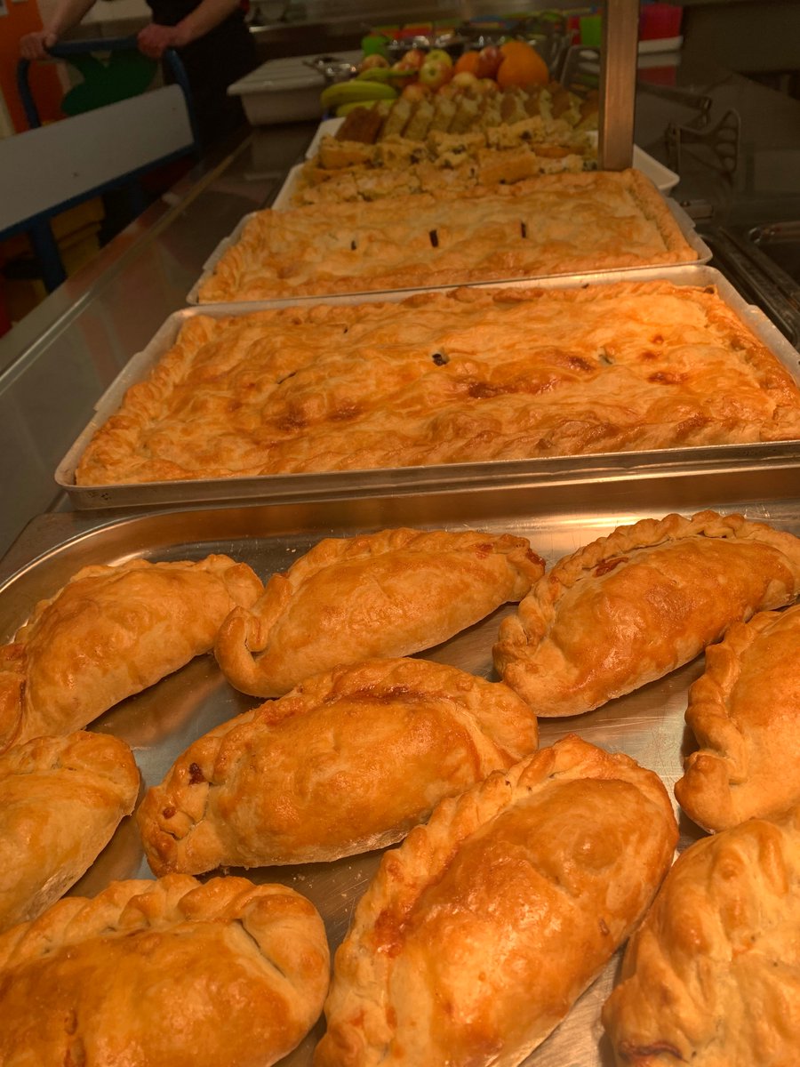 PensansSchool's tweet photo. We all enjoyed a real St Piran's Cornish treat at lunchtime today! Pasties and Hevva cake - truly delicious! @PensansSchool #stpiransday @tpacademytrust https://t.co/ACIhpPvzbp