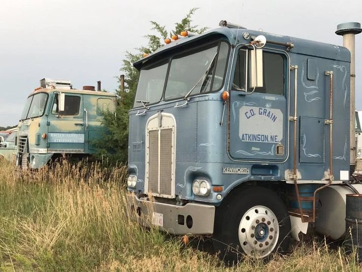 Old cabovers waiting on someone to restore them to their former glory.