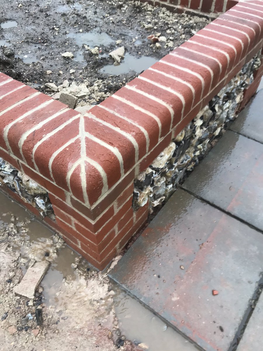 NCGardendesign's tweet photo. Wonderful craftsmanship from Steve @TransformLands #flintwall #gardendesign I can’t wait for the #plants and #turf to finish the #design https://t.co/Aq1QkD3Oza