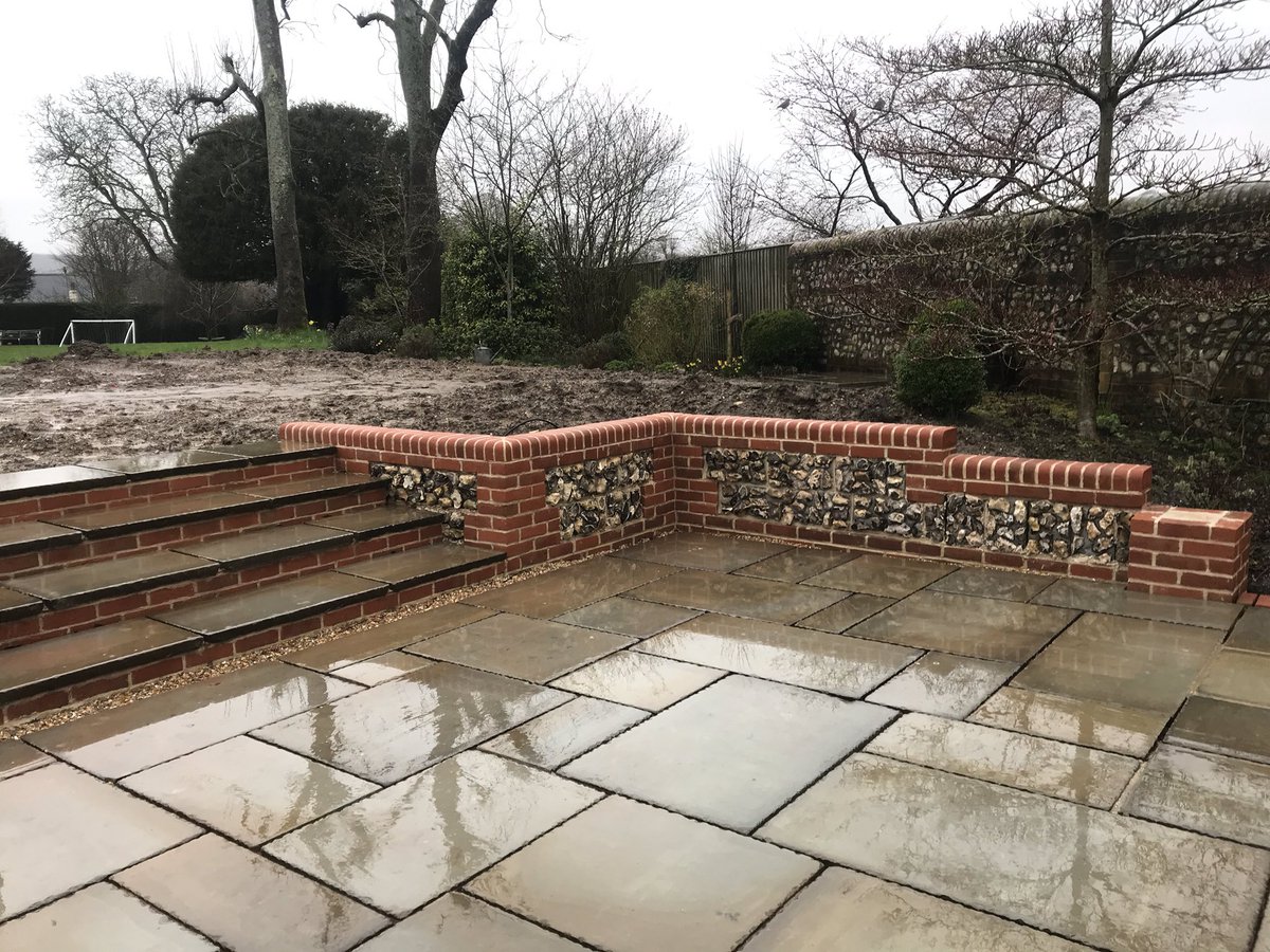 NCGardendesign's tweet photo. Wonderful craftsmanship from Steve @TransformLands #flintwall #gardendesign I can’t wait for the #plants and #turf to finish the #design https://t.co/Aq1QkD3Oza