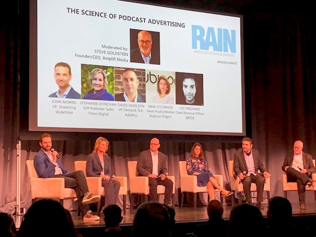 WideOrbit's tweet photo. John Morris, WideOrbit’s VP of Streaming and On Demand, speaking about the science of #podcast advertising at #RAINSummit. Thanks to everyone who was a part of the event. https://t.co/tS4caQujDL