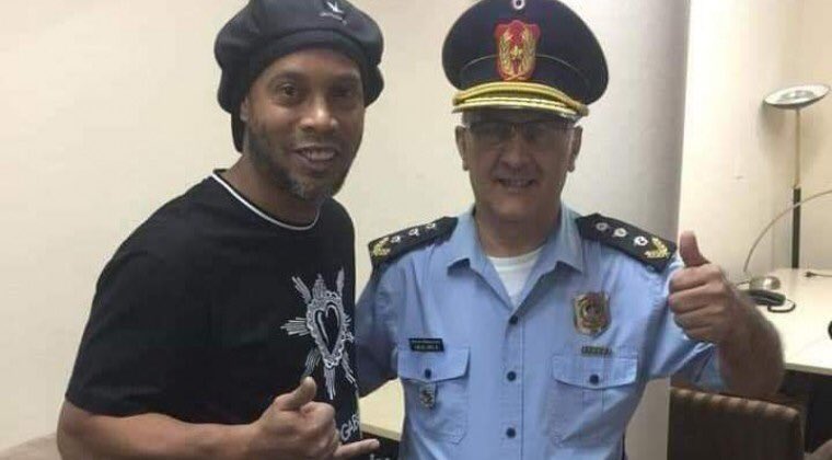 Of course, if you’re the Paraguayan police, you can’t arrest Ronaldinho without getting a picture with Ronaldinho first.