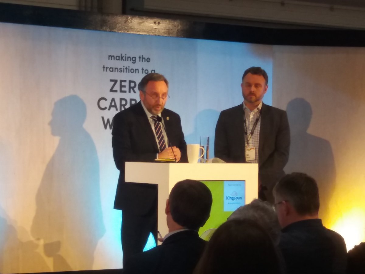 healycornelius's tweet photo. @CIATPresident Eddie Weir PCIAT and @GavinDunn2 CEO of @cbuilde  share the stage @FuturebuildNow to address the audience delivering an update on progress to meet the ZeroCarbon challenge https://t.co/5t4AiKgs2g