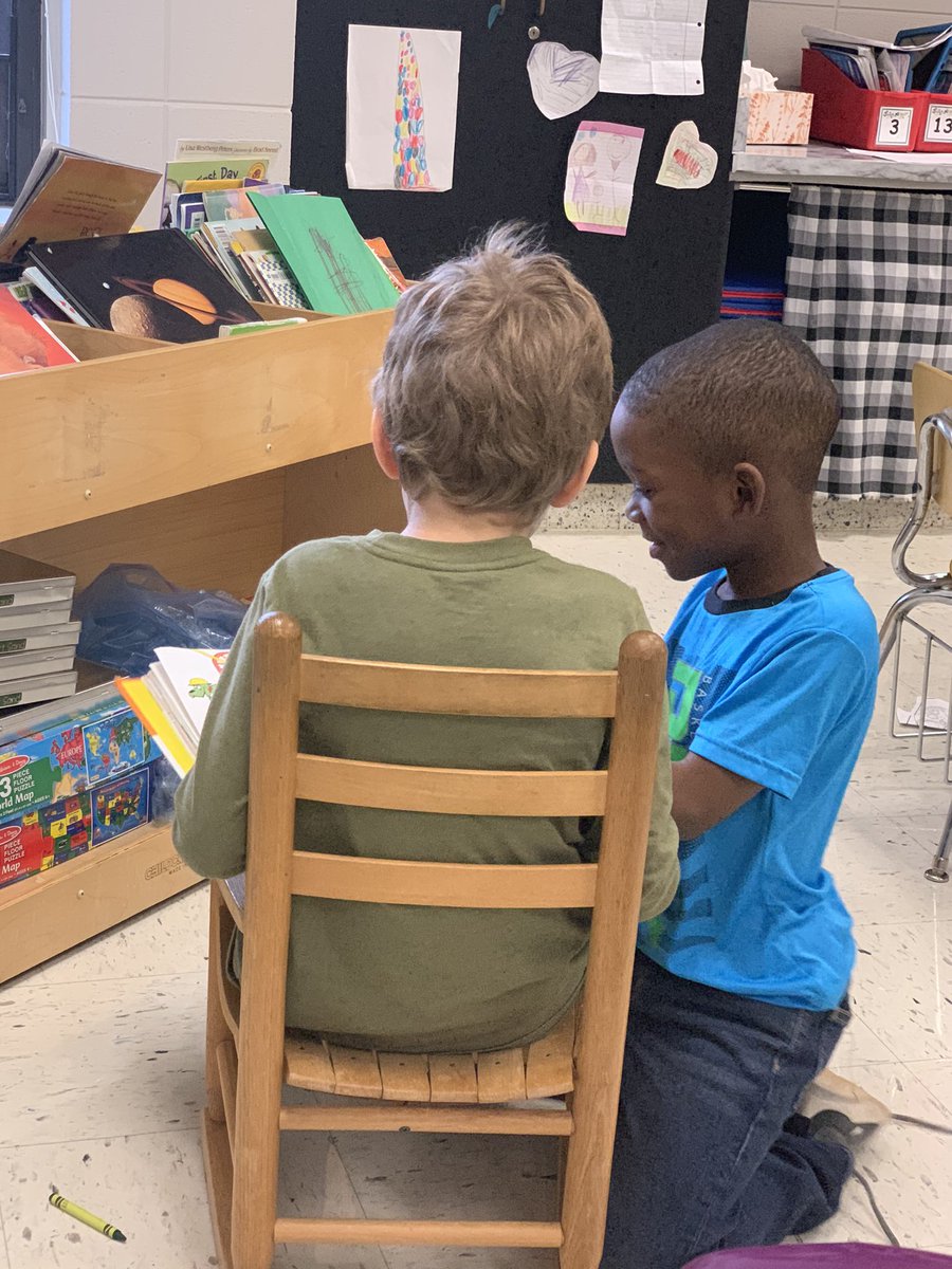 annaespangler's tweet photo. Caught two of my little loves deeply engaged in Dr. Seuss during indoor recess. #ReadAcrossAmerica https://t.co/Lwwp62RfiR