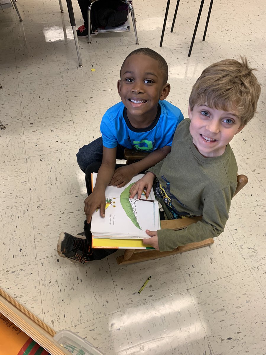 annaespangler's tweet photo. Caught two of my little loves deeply engaged in Dr. Seuss during indoor recess. #ReadAcrossAmerica https://t.co/Lwwp62RfiR