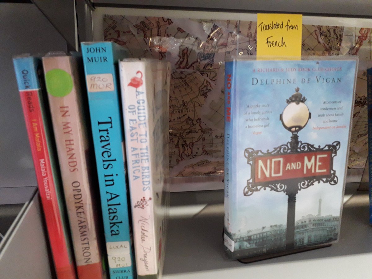 DGSModLang's tweet photo. "Books without Borders" special collection in DGS library. Reading around the world with books set in foreign countries or translated into English. #GlobalCitizen #literacy #WorldBookDay @DunbarLrc https://t.co/AyYZsM8Brx