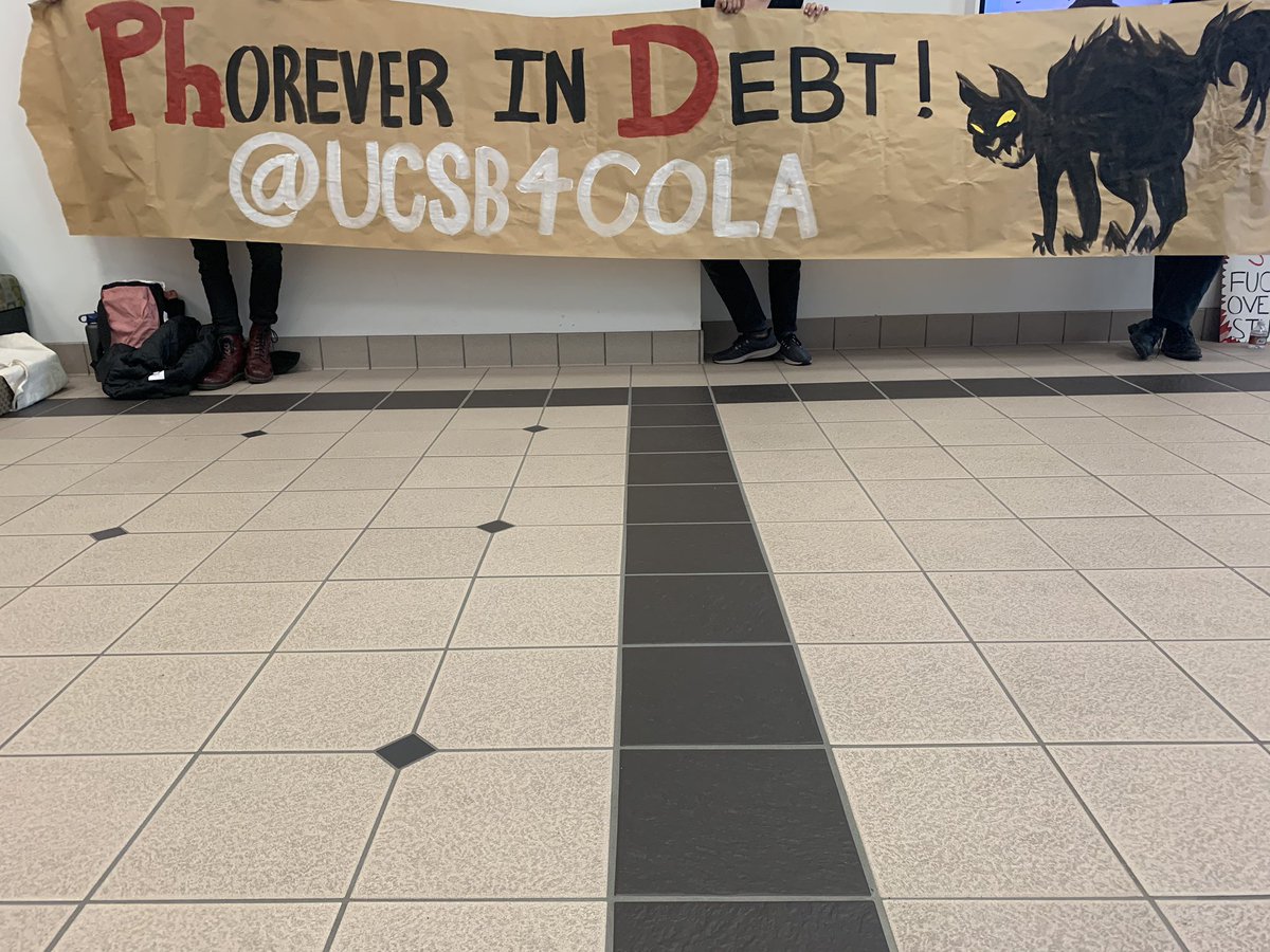 Banner reads “Phorever in Debt @ucsb4cola”
