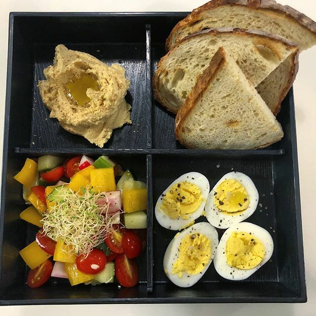 This week's lunch box features toast, hard boiled eggs, roasted garlic hummus, and chopped vegetable salad ift.tt/39t5f3L