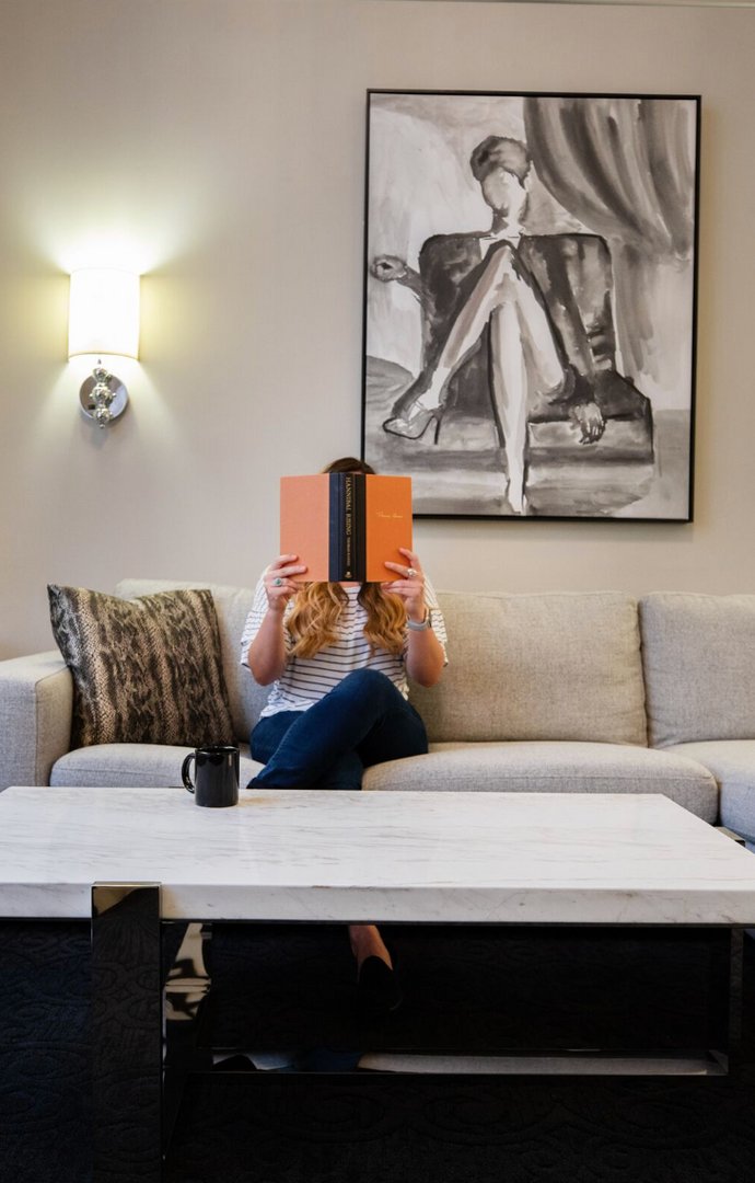 AmbassadorKCMO's tweet photo. With rooms as cozy as ours, we wouldn't blame you for staying in today for #WorldBookDay with a captivating book and a hot cup of tea. #AmbassadorHotelKansasCity https://t.co/7k5VxMjO4I