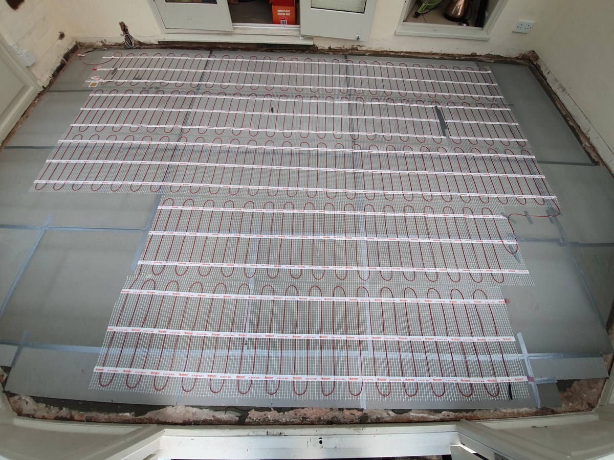 MT_Electrical's tweet photo. Installation of electric underfloor heating. Insulation boards should always be used to ensure maximum heat retention and dispersion. #Electrical #UnderfloorHeating #Conservatory #Heating https://t.co/GiWYcLZI6e