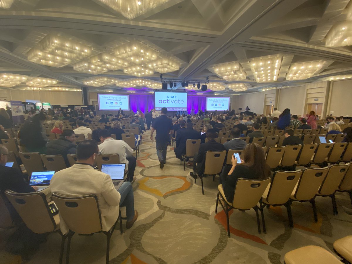 AIMEnational's tweet photo. Find your seat! Our keynote speaker, @SeeReneSpeak is about to take the stage #AIMEActivate https://t.co/uhDcEXrhoE