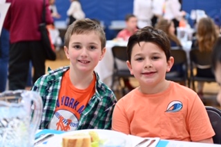 Enjoying a wonderful meal and making new friends at the 2nd Grade Coleman Café! A huge thank you to our moms, dads and grandparents for serving us!!!! #RockGRNJ