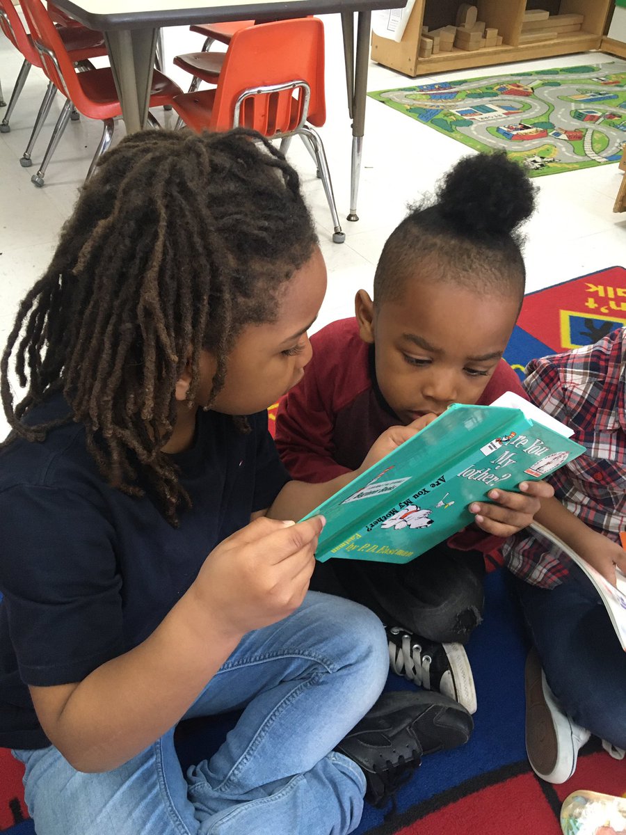 EOYPrek's tweet photo. Two friends sharing a book @eotigers #sharevcs https://t.co/oJofstuk49