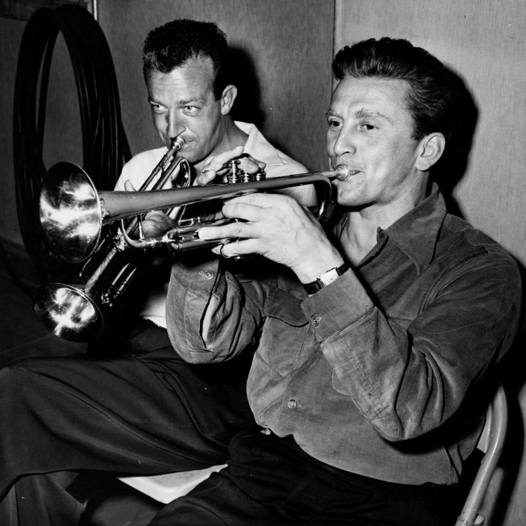 tcm's tweet photo. Harry James and Kirk Douglas on the set of YOUNG MAN WITH A HORN ('50). James performed the music Douglas is shown playing on screen. https://t.co/7wqZzs2snd
