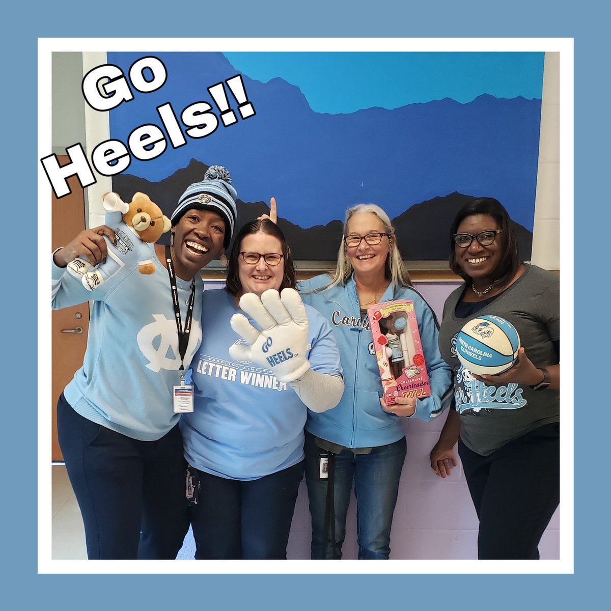 PoeMagnetES's tweet photo. This happens when your principal, math coach, art teacher & magnet coordinator are all #UNCAlumni who love their alma mater & contests. @UNCGAA, we're ready to enjoy some @TheMadPopper popcorn while we watch @UNC #BeatDuke! #Raleigh stand up! #PoePandaPower https://t.co/ryhyhx9NP8
