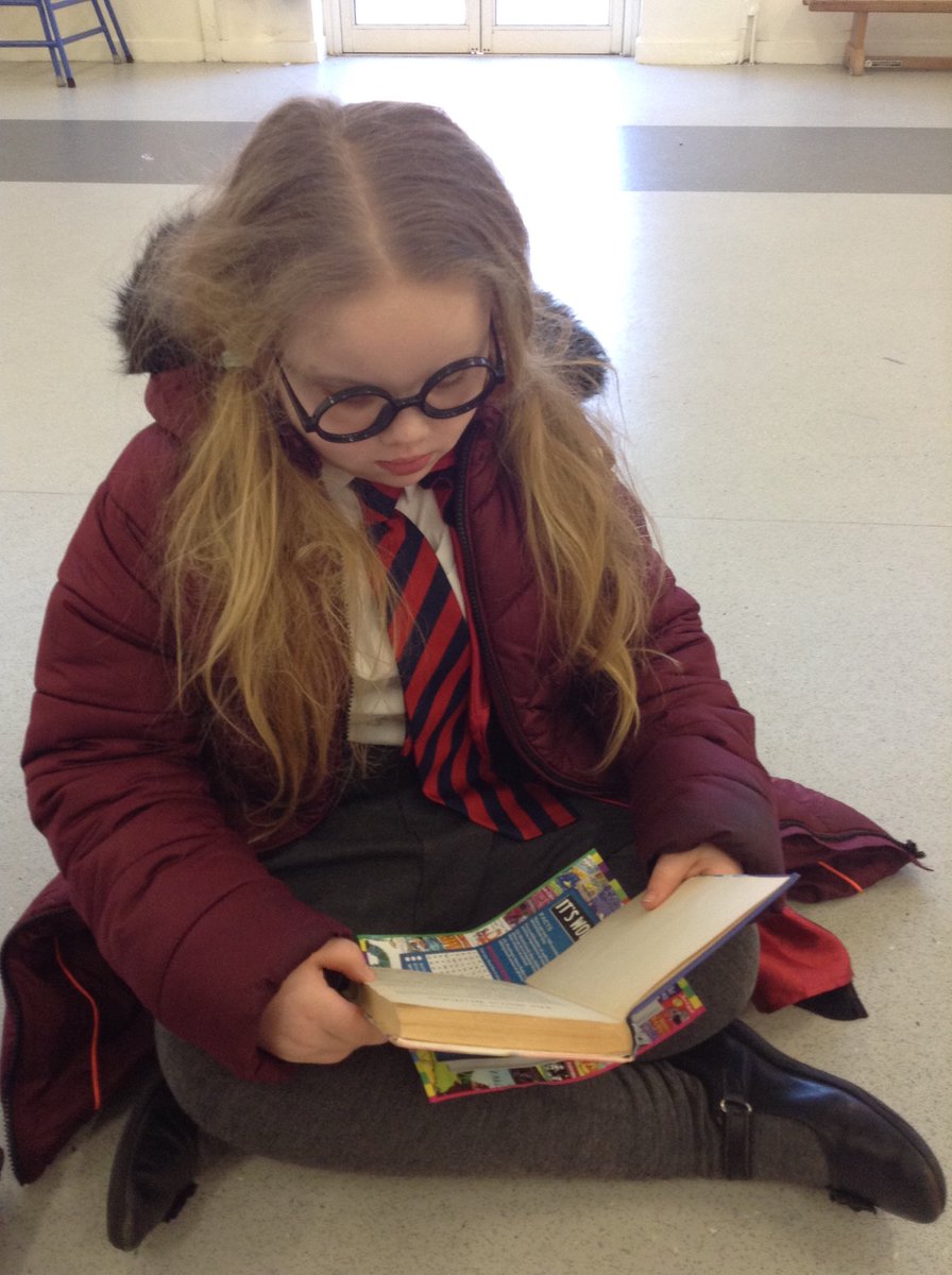 RHeaney3's tweet photo. Getting lost at lunchtime in a book....#nsprimary https://t.co/2G9ghPGV23