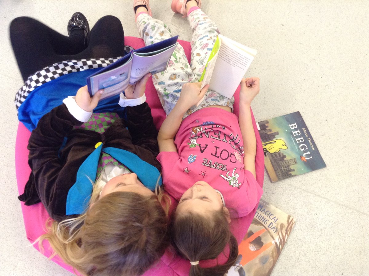 RHeaney3's tweet photo. Getting lost at lunchtime in a book....#nsprimary https://t.co/2G9ghPGV23
