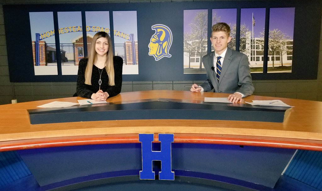 Jenna and Ashton anchor tomorrow's show, which you can catch 5th period. Also watch stories over Homestead at DECA, Drivers Education at HHS, Instructional Assistants at school, as well as Tech Talk, The Locker Report and weekend weather.