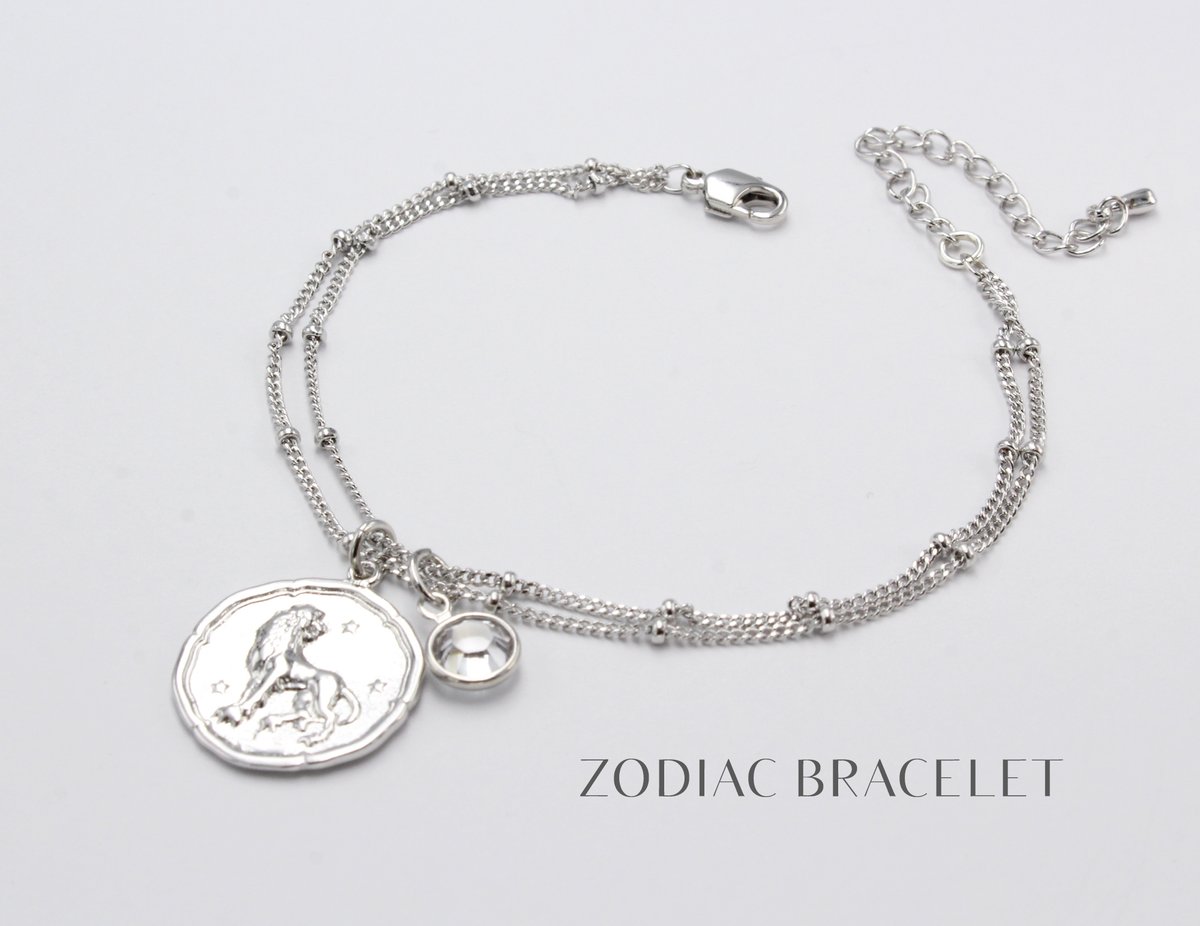 NEW! Silver Zodiac Coin Bracelet with Birthstone. 
20% off now💕 #zodiacbracelet #zodiacbirthstonejewelry #Pisceszodiaccoindiscjewelry #marchbirthdaygift