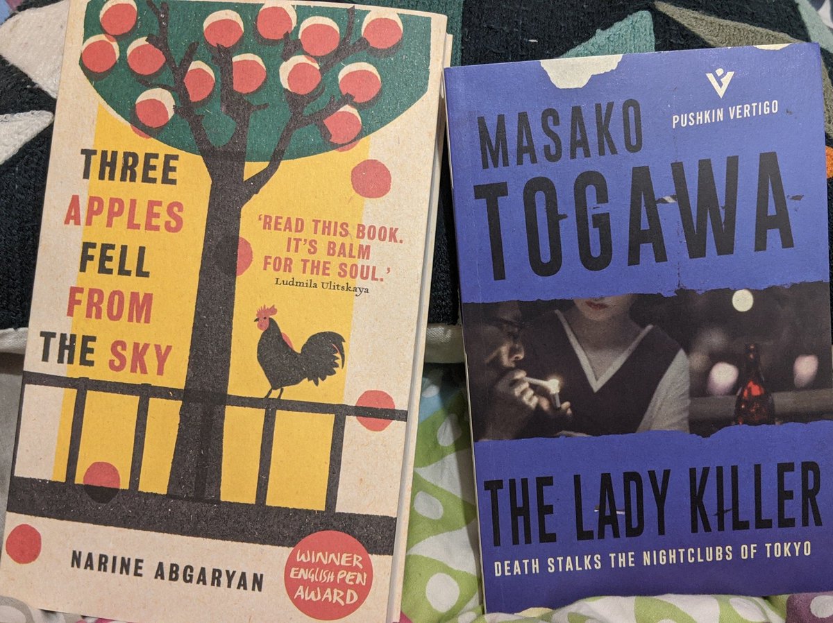 Muireann's tweet photo. More #WorldBookDay: Shouldering towering piles of #HilaryMantel hardbacks aside with a brutality that would have done Thomas Cromwell proud,I fetched these home.Especially thrilled with #ThreeApples,my 1st novel by an Armenian woman writer, Marine Abgaryan (trans. @LizoksBooks ). https://t.co/d42zvjVnAi