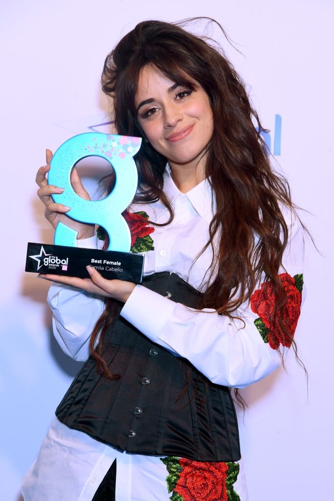 Camila with her Best Female award at #TheGlobalAwards press room #4