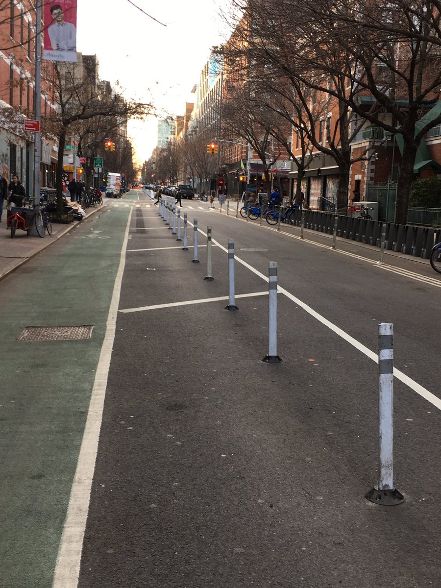 12stTales's tweet photo. Just noticed @NYC_DOT doubled the frequency of the flex bollards here protecting the 13th st #bikeNYC lane in Manhattan. Much tighter configuration than 12st here on the right. https://t.co/kuItVJEuEM