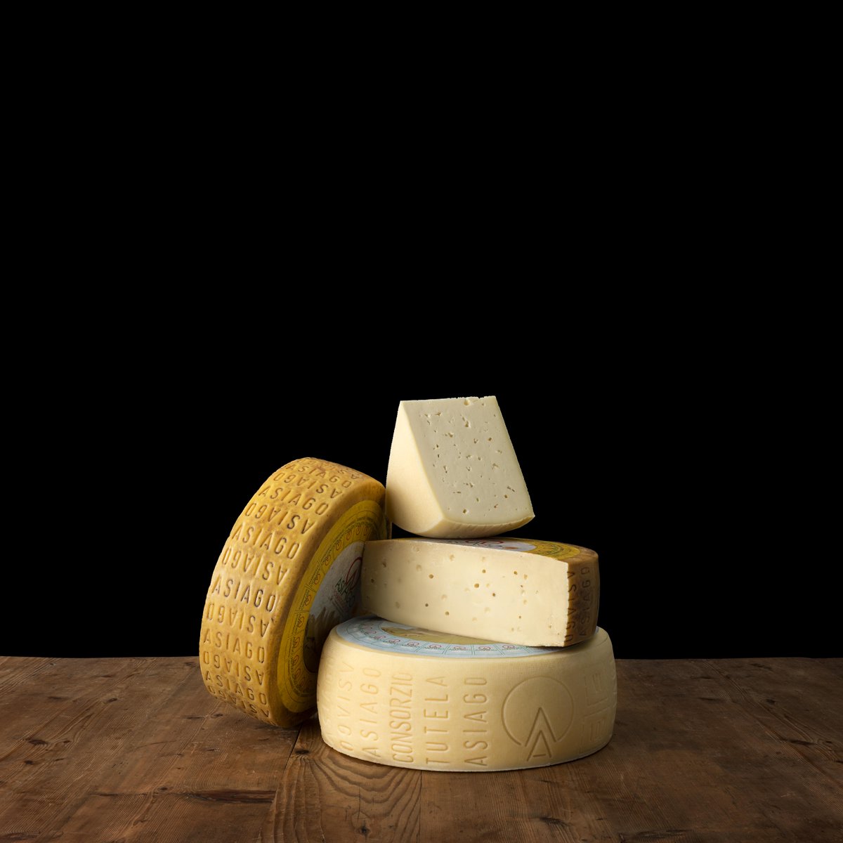 UncommonEurope's tweet photo. There are two versions of Asiago cheese, both made in Italy: Aged, or stagionato, &amp; Fresh, or fresco. The aged has a bouquet of aromas and flavor, from floral to nutty to intense while the fresh is creamy and milky. Both delicious! https://t.co/faEYYkKpLL https://t.co/vuiuTST67c