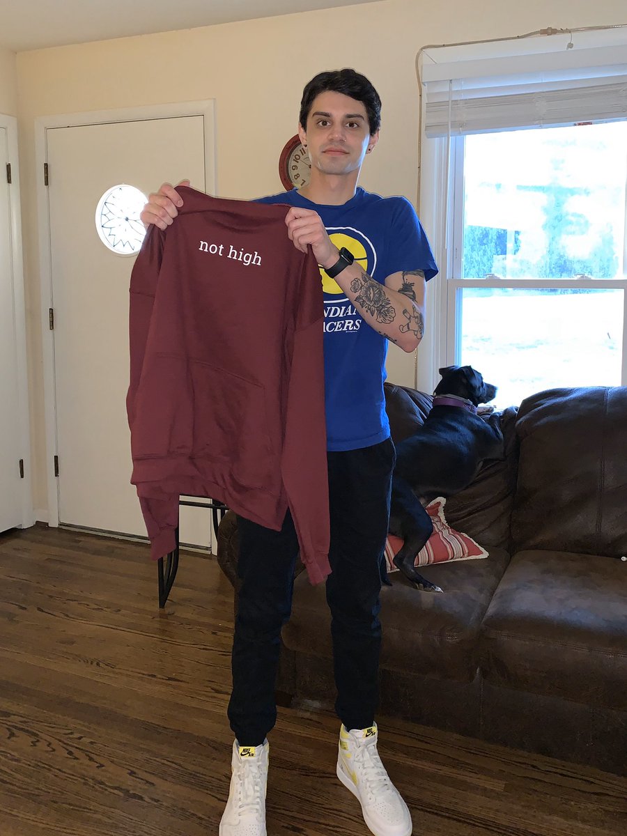 Keefler_Elf's tweet photo. i’m giving away a brand new not high hoodie! specifically this super soft maroon one (L) that i’m holding here. just retweet and follow and i’ll pick a winner tomorrow who will never have to experience public high anxiety again https://t.co/erk5HQLzoa