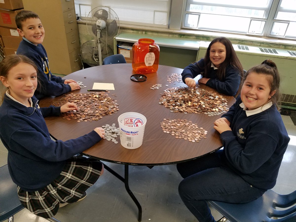 OLLIndy's tweet photo. Counting all of the change we donated to Catholic Charities of Indianapolis through our Penny War! https://t.co/G8yT5slXT4