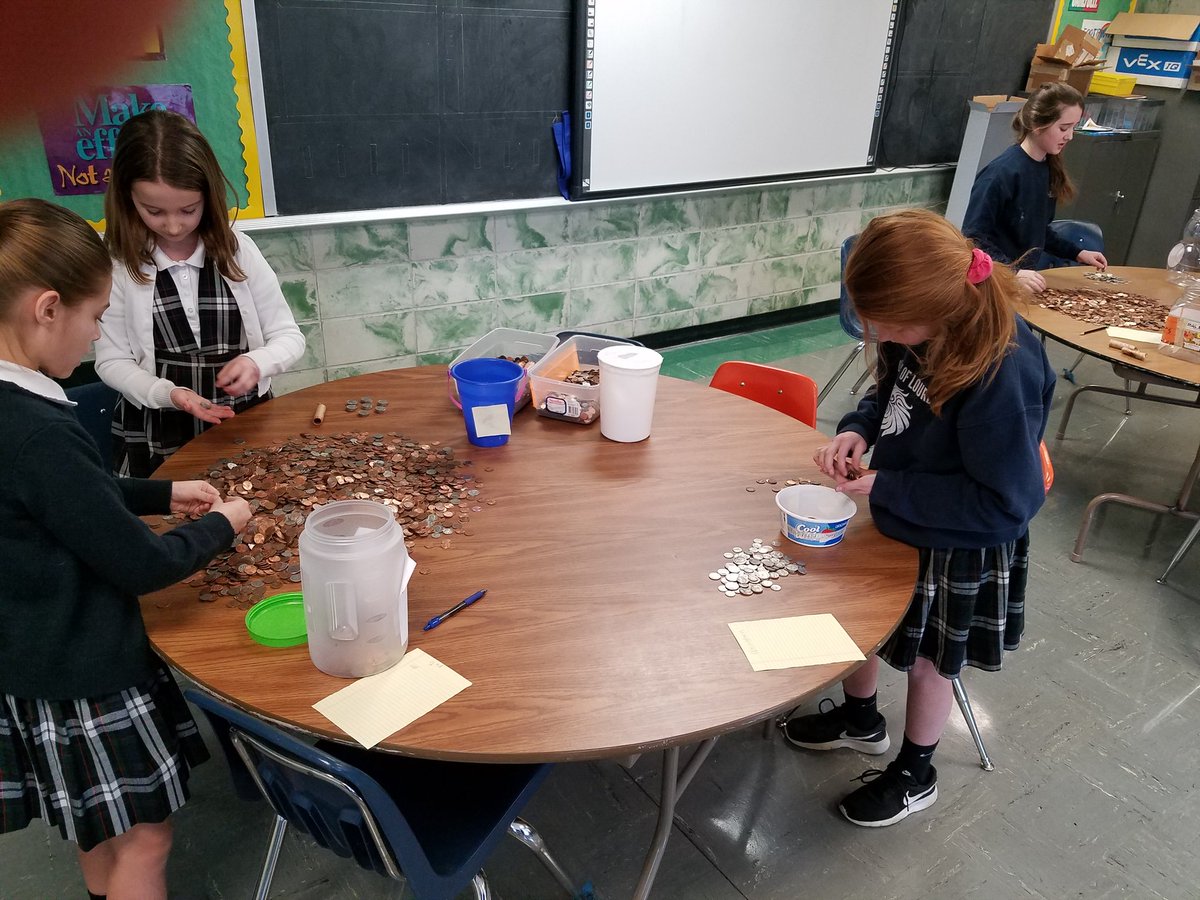OLLIndy's tweet photo. Counting all of the change we donated to Catholic Charities of Indianapolis through our Penny War! https://t.co/G8yT5slXT4