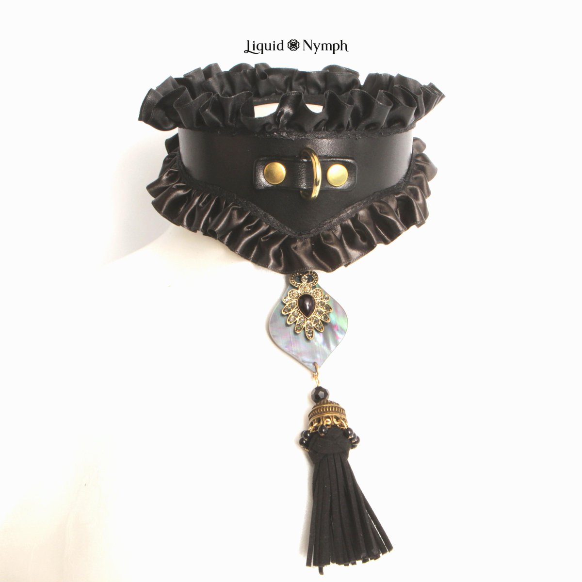 A "come-hither" stare from behind a black lace curtain. All eyes will be on you- tempting curious glances &amp; soft whispers, keeping them all guessing!  Easily matched with any ensemble while still remaining unique to the usual ho-hum simplicity of a black leather collar #bdsm