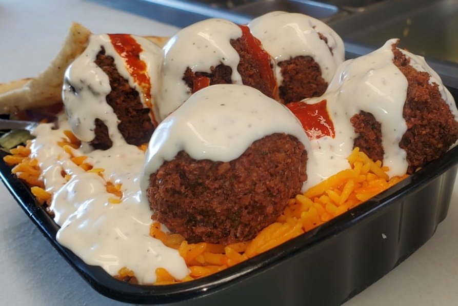 FoodVirginia's tweet photo. Falafel over rice https://t.co/95RtDi9SsF