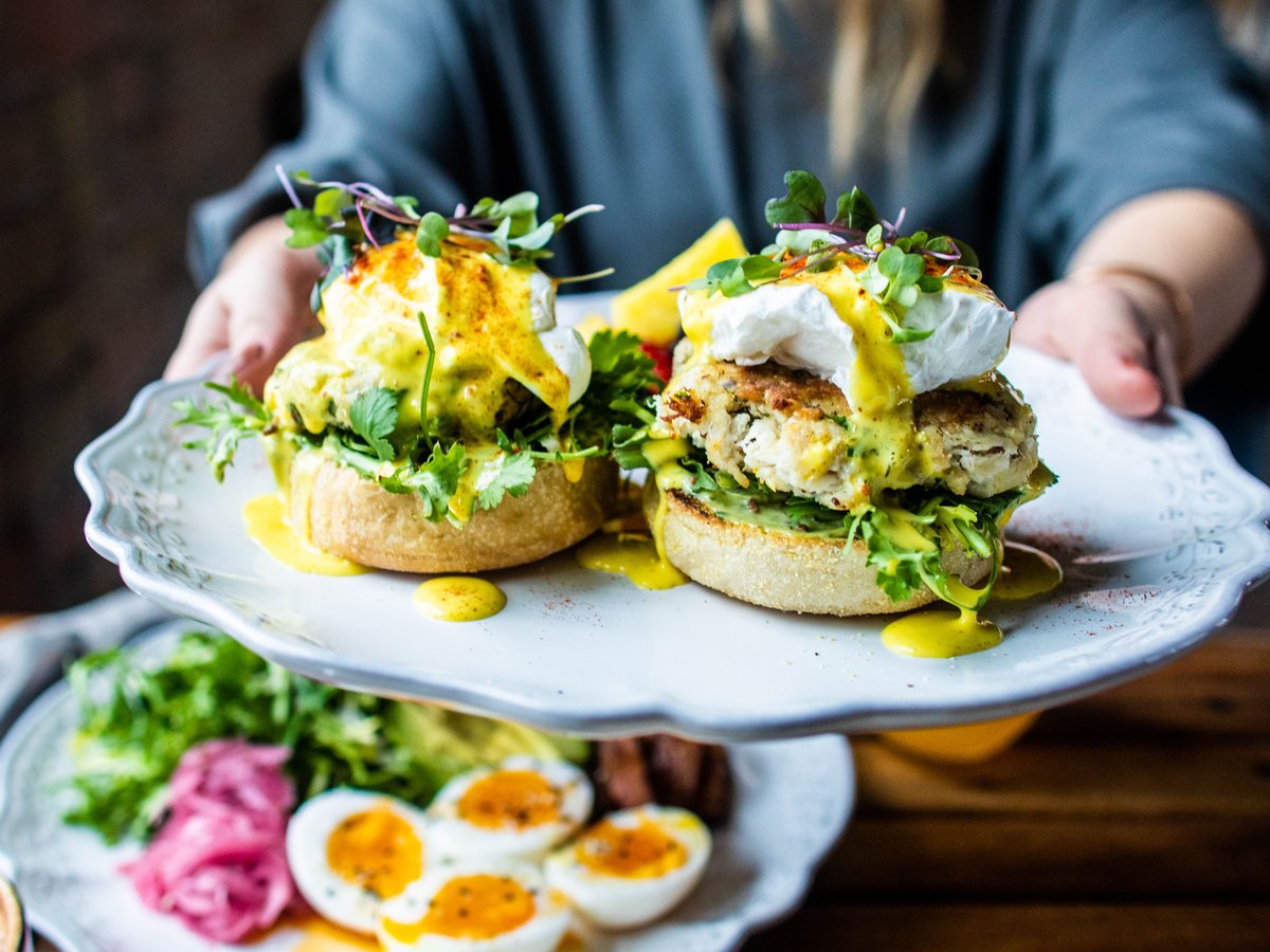 WaltonsAustin's tweet photo. Our show-stopping crab cake benedict with poached egg + frisée + hollandaise + paprika | Who’s taking the first bite? 

📸: @dandeliongatherings https://t.co/l94F8LvOc5