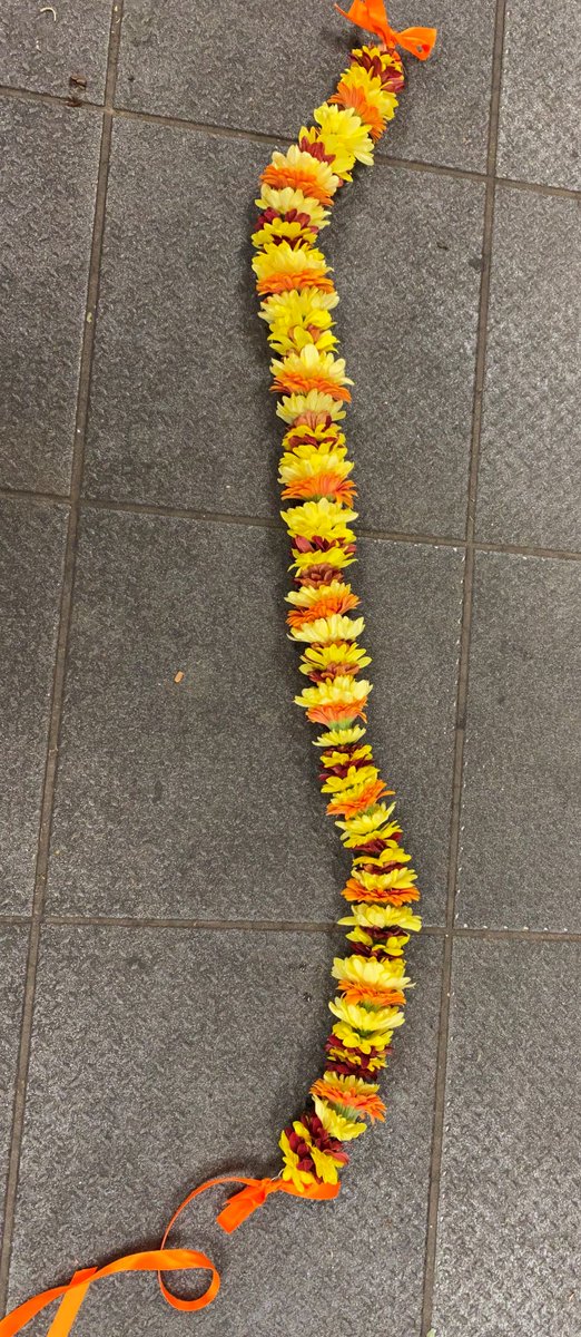 RodgersFlorist's tweet photo. Flower garlands which we created for a recent funeral - one to go around a photo and the other for the person who passed away 🧡 #funeralgarland #flowergarland #funeralflowers #manchester #manchesterflorist https://t.co/JJEfE904E0
