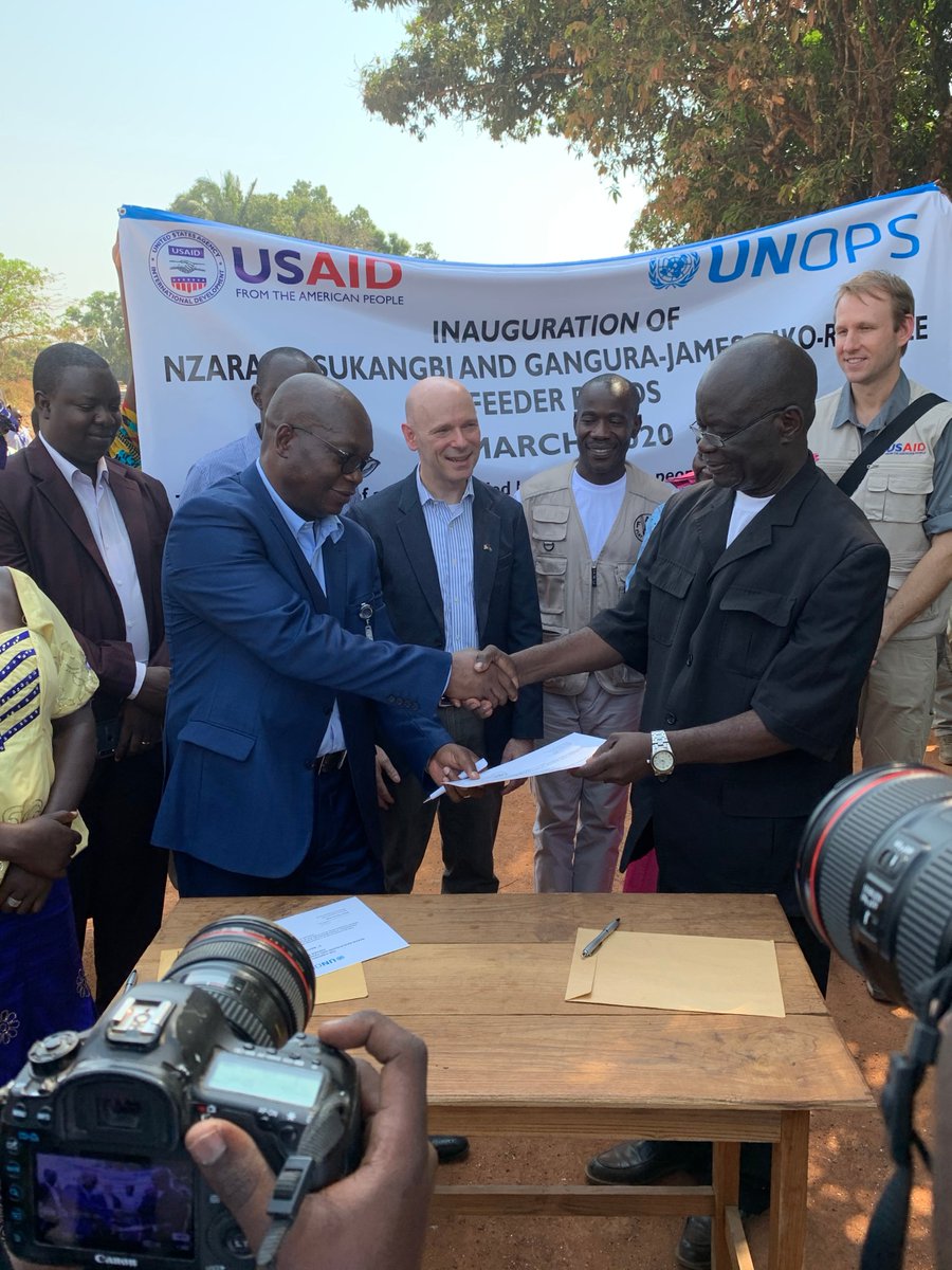 U.S Ambassador to #SouthSudan Tom Hushek cuts the ribbon to officially inaugurate the 78km of feeders roads in Western Equatoria, rehabilitated by <a href="/UNOPS/">UNOPS</a> with funding from <a href="/USAIDSouthSudan/">USAID South Sudan</a>